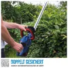 A person is using a cordless hedge trimmer to trim a bush. Produktbild-Vorschau