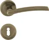 A door handle set with a round rosette, shown against a white background. Produktbild-Vorschau