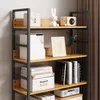 A close-up view of a bookshelf filled with books and decorative items. Produktbild-Vorschau
