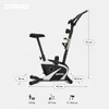 A stationary exercise bike with dimensions and weight information displayed. Produktbild-Vorschau