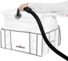 A person is using a vacuum cleaner hose to remove air from a large white storage bag. Anteprima dell’immagine prodotto
