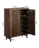 A dark brown wooden cabinet with slatted doors and shelves, with dimensions indicated. The cabinet is open, showing multiple shelves. Náhľad obrázku produktu
