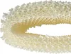 A close-up, coiled view of a white humidifier filter against a white background. Produktbild-Vorschau