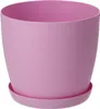 A pink plant pot with a saucer. Anteprima dell’immagine prodotto