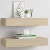 Two wooden shelves mounted on a white wall, decorated with books, a plant, and a vase. Produktbild-Vorschau