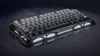 A 75% wireless mechanical gaming keyboard with a unique, futuristic design, presented on a dark, reflective surface. Produktbild-Vorschau