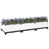 A long, white, modular planter box filled with purple and yellow flowers, set against a white background. Anteprima dell’immagine prodotto
