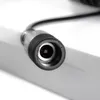 A close-up view of a black and silver electrical connector with a black cable attached, resting on a light gray surface. Produktbild-Vorschau