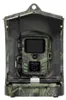 A camouflage-patterned trail camera is shown in an open housing. Podgląd zdjęcia produktu
