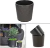A collage of images showing brown woven-look planters, one with plants and another showing a black insert. Produktbild-Vorschau