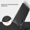A black phone case is shown at an angle, with a close-up inset highlighting its protective features. The background is a gradient of white to light gray. Náhled obrázku produktu