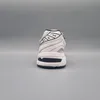 The back view of a white and navy athletic shoe against a plain gray background. Produktbild-Vorschau