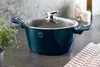A teal pot with a glass lid sits on a countertop next to a plant and a checkered cloth. Podgląd zdjęcia produktu