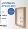 A wooden picture frame with a white mat is shown against a light gray background, with text and graphics highlighting its features. Voir les images du produit