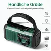 A green emergency radio with a handle, solar panel, and antenna, shown against a light background with text overlays describing its features. Produktbild-Vorschau