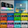 A collage of images showcasing a digital wall clock in various colors and settings, along with text descriptions and a logo. Produktbild-Vorschau