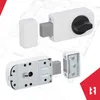 A collage of images showing different views of a white door lock with a gray bolt and a black knob, set against a blueprint-like background. Náhled obrázku produktu