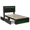 A black upholstered bed frame with a slatted base and integrated LED lighting. Podgląd zdjęcia produktu