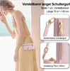 A woman wearing a dress and a pink crossbody phone case. Produktbild-Vorschau