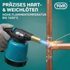 A hand wearing a glove is holding a blowtorch and applying flame to copper pipes, soldering them together. Produktbild-Vorschau