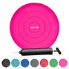 A pink balance cushion with a pump and several other colored cushions shown below. Produktbild-Vorschau