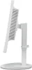 Side view of a white computer monitor on a white stand and base. Produktbild-Vorschau