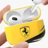 A hand holding a yellow Ferrari-branded AirPods 3 case with AirPods inside. Náhľad obrázku produktu