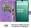 A purple wallet-style phone case for a Samsung Galaxy A16 5G is shown open, displaying credit cards and cash. The phone screen shows the Samsung logo and product name. Produktbild-Vorschau