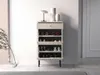 A shoe cabinet with a drawer and multiple shelves, displaying various shoes and decorative items, placed in a room with a white wall and a hint of a doorway. Náhľad obrázku produktu