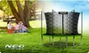 A family is having a picnic in a park next to a trampoline. Produktbild-Vorschau