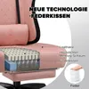 A cutaway view of a pink gaming chair showing its internal structure and materials, with text overlays and a small inset image of a hand pressing down on springs. Produktbild-Vorschau