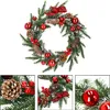 A Christmas wreath decorated with pine cones, red berries, and red ornaments, set against a white background. Náhľad obrázku produktu