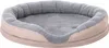 A pet bed with a beige exterior and a gray plush interior. Produktbild-Vorschau
