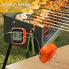A digital meat thermometer is shown attached to a grill with food cooking on it. Náhled obrázku produktu