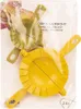 Two plastic dumpling molds, one yellow and one green, are shown in their packaging. Produktbild-Vorschau