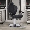 A black salon chair with a silver base and footrest, placed in what appears to be a salon or barbershop setting. Produktbild-Vorschau