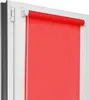 A red roller blind installed in a white window frame. Produktbild-Vorschau