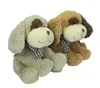 Two plush dog toys sitting side-by-side. Produktbild-Vorschau