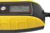 Close-up of a yellow and black battery charger with a digital display. Podgląd zdjęcia produktu