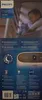 The back of a Philips air purifier box, showing a sleeping baby and product features. Produktbild-Vorschau