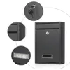 A black mailbox with a keyhole and a slot for mail, shown with close-up views of its details. Podgląd zdjęcia produktu