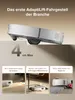 A robot vacuum cleaner is shown demonstrating its ability to climb over obstacles and navigate under furniture, with accompanying text highlighting its features. Produktbild-Vorschau