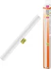 A white LED tube light with a yellow clip, next to its packaging. Náhľad obrázku produktu