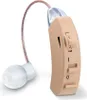 A close-up studio shot of a beige hearing aid with an earbud and a wire, isolated on a white background. Podgląd zdjęcia produktu