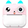 A pink toy camera with cartoon features. Anteprima dell’immagine prodotto