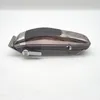 A professional studio shot of a hair clipper on a white background. Podgląd zdjęcia produktu