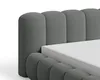 A close-up view of a gray upholstered bed frame with a white mattress. Voir les images du produit