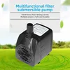 A black submersible pump is shown in the foreground against a green, abstract background with swirling water patterns and floating leaves. Text overlays describe the product's features. Náhled obrázku produktu