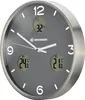 A close-up, angled view of a modern wall clock with a dark gray face, white numbers, and three digital displays showing temperature, humidity, and weather. Produktbild-Vorschau