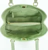 The inside of a light green tote bag is shown. Produktbild-Vorschau